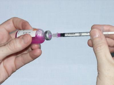 Remove syringe from bottle